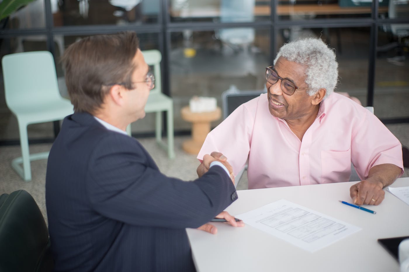 Advisor greeting a private wealth client