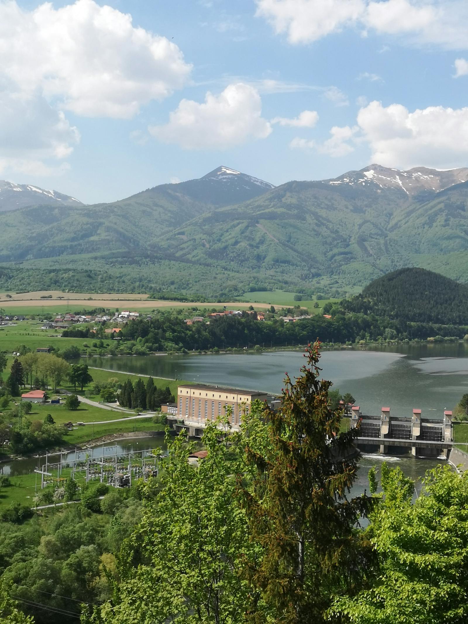 Hydroelectric infrastructure set within a mountain landscape